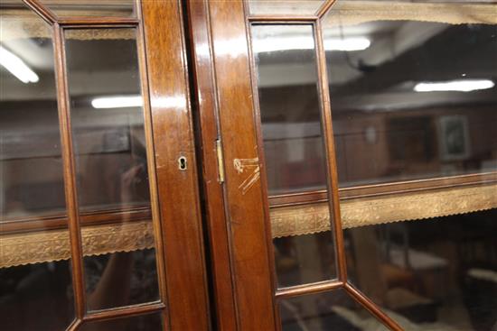 An Edwardian George III style mahogany breakfront library bookcase, W.9ft 2in. D.1ft 11in. H.8ft 6in.